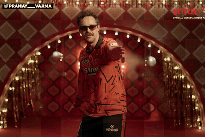 A Man Wearing Sunglasses And A Shirt That Says Iroon On It GIF