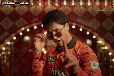 A Man Wearing Sunglasses And A Shirt That Says Shree GIF
