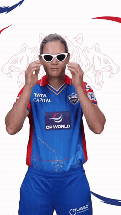 A Man Wearing Sunglasses And A Shirt That Says Tata Capital On It GIF