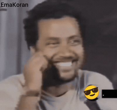 A Man Wearing Sunglasses And A Smiley Face With The Word Emakoran On The Bottom Right GIF
