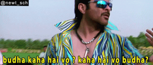 A Man Wearing Sunglasses And A Striped Shirt Says Buddha Kaha Hai Vo Kaha Hai Vo Buddha GIF