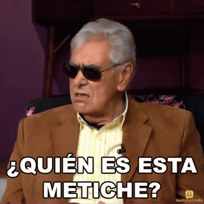 A Man Wearing Sunglasses And A Suit Says " Quien Es Esta Metiche " GIF