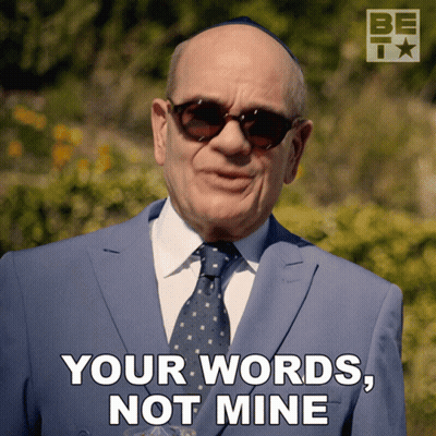 A Man Wearing Sunglasses And A Suit Says Your Words Not Mine GIF