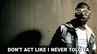 A Man Wearing Sunglasses And A T-Shirt That Says ' Dont Act Like I Never Told Ya ' GIF