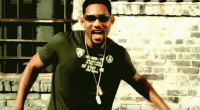 A Man Wearing Sunglasses And A T-Shirt That Says Will Smith GIF