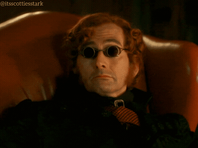 A Man Wearing Sunglasses And A Tie Is Sitting In A Chair And Says He 'S Got A Point GIF