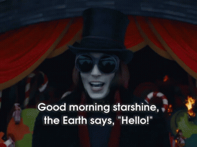 A Man Wearing Sunglasses And A Top Hat Says Good Morning Starshine The Earth Says Hello GIF