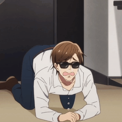 A Man Wearing Sunglasses And A White Shirt Is Crawling On The Floor GIF