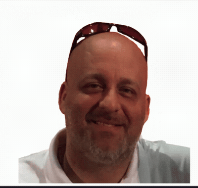 A Man Wearing Sunglasses And A White Shirt Smiles For The Camera GIF