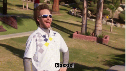 A Man Wearing Sunglasses And A White Shirt With The Word Classic On The Bottom GIF