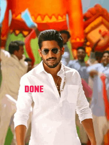 A Man Wearing Sunglasses And A White Shirt With The Word Done On The Bottom Right GIF