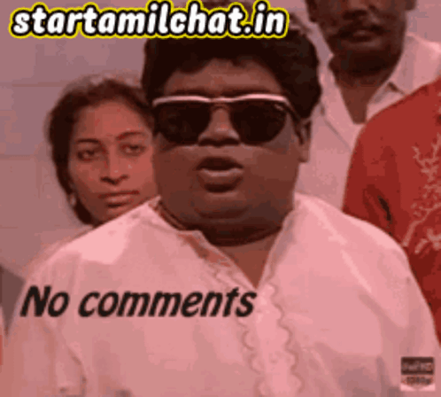 A Man Wearing Sunglasses And A White Shirt With The Words No Comments On It GIF