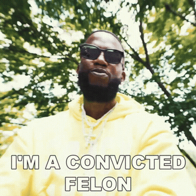 A Man Wearing Sunglasses And A Yellow Hoodie Has The Words I 'M A Convicted Felon Below Him GIF