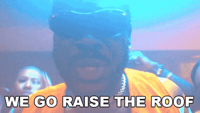 A Man Wearing Sunglasses And A Yellow Shirt Says " We Go Raise The Roof " GIF