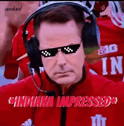 A Man Wearing Sunglasses And Headphones With The Words Indiana Impressed GIF