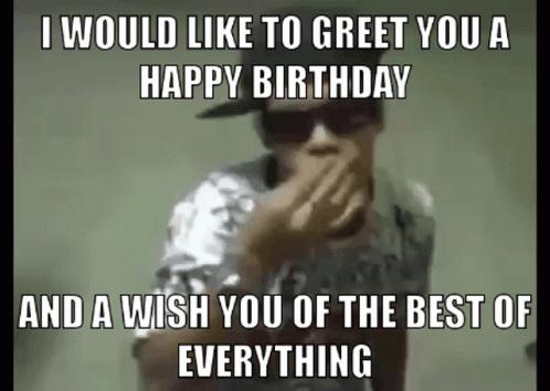 A Man Wearing Sunglasses Is Covering His Mouth With His Hand And Says I Would Like To Greet You A Happy Birthday . GIF