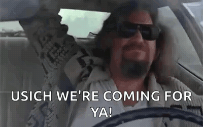 A Man Wearing Sunglasses Is Driving A Car And Saying `` Usich We 'Re Coming For Ya! '' GIF