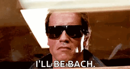 A Man Wearing Sunglasses Is Driving A Car And Says `` I 'Ll Be Back '' . GIF