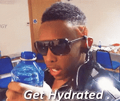 A Man Wearing Sunglasses Is Holding A Bottle Of Water With The Words Get Hydrated Written On It GIF