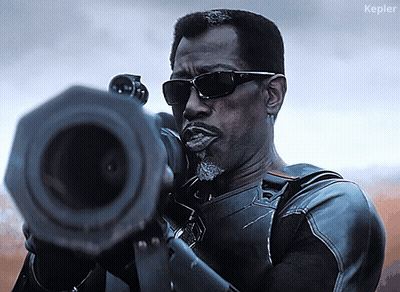 A Man Wearing Sunglasses Is Holding A Gun And The Word Kepler Is On The Bottom Right GIF