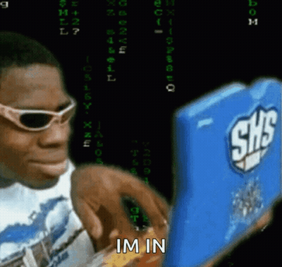 A Man Wearing Sunglasses Is Looking At A Shs Device GIF