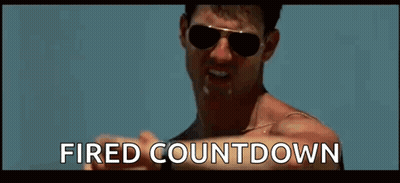 A Man Wearing Sunglasses Is Pointing At His Watch And The Words Fired Countdown Are Written Below Him . GIF