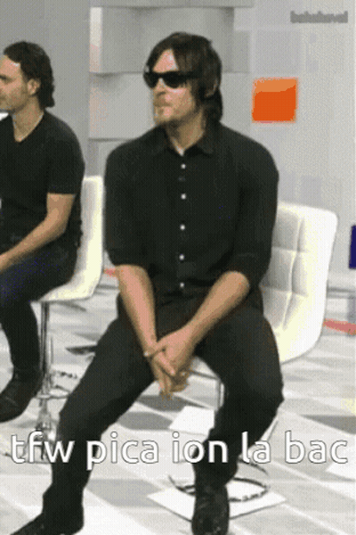 A Man Wearing Sunglasses Is Sitting On A Chair With The Words Tfw Pica Ion La Bac Written On The Bottom GIF