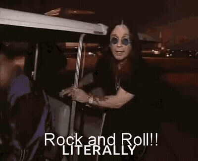 A Man Wearing Sunglasses Is Standing In A Golf Cart And Says `` Rock And Roll ! '' GIF