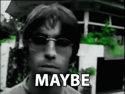 A Man Wearing Sunglasses Is Standing In Front Of A Building With The Words `` Maybe '' Written On His Face . GIF