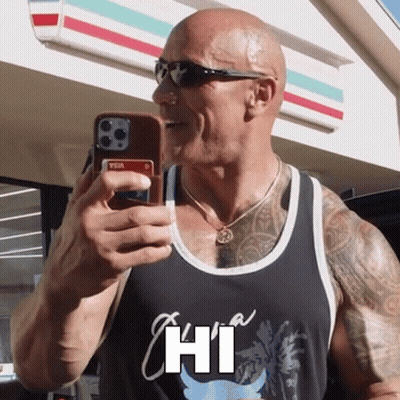 A Man Wearing Sunglasses Is Taking A Picture Of Himself With His Cell Phone And Says Hi In White GIF