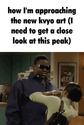 Sunglasses Man Talking To Woman In Kitchen About New Kvyo Art GIF