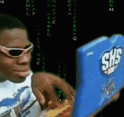 A Man Wearing Sunglasses Looks At A Shs Box GIF