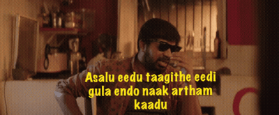 A Man Wearing Sunglasses Says Asalu Eedu Taagitthe Eedi Gula Endo Naak Artham Kaadu GIF