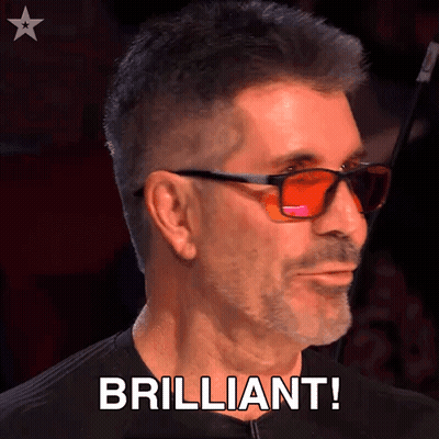 A Man Wearing Sunglasses Says " Brilliant " In Front Of His Face GIF