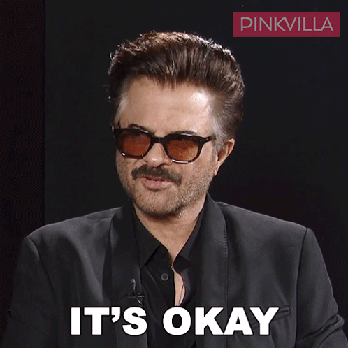 A Man Wearing Sunglasses Says It 'S Okay In White Letters GIF