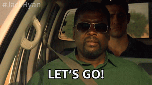 A Man Wearing Sunglasses Says Let 'S Go While Sitting In A Car GIF