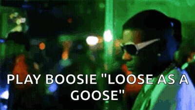 A Man Wearing Sunglasses Says Play Boosie " Loose As A Goose " In Front Of A Crowd GIF