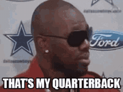 A Man Wearing Sunglasses Says That 'S My Quarterback . GIF