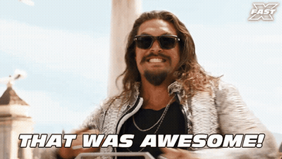 A Man Wearing Sunglasses Says That Was Awesome On The Screen GIF