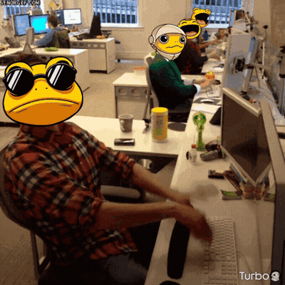 A Man Wearing Sunglasses Sits At A Desk With A Turbo Logo On The Bottom Right GIF