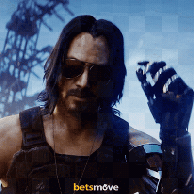 A Man Wearing Sunglasses Stands In Front Of A Sign That Says ' Betsmove ' GIF