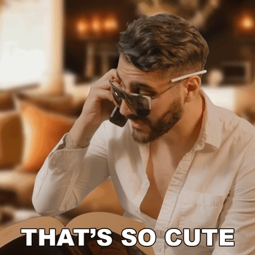 A Man Wearing Sunglasses Talking On A Cell Phone With The Words That 'S So Cute Written Below Him GIF