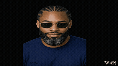 a man wearing sunglasses that say dope and black dad