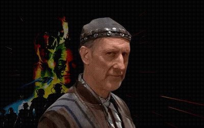 A Man Wearing Sunglasses With The Words Happy First Contact Day Behind Him GIF