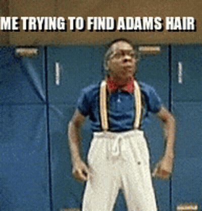A Man Wearing Suspenders Is Standing In Front Of A Blue Wall With The Words Me Trying To Find Adams Hair Above Him GIF