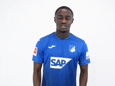 A Man Wears A Blue Shirt With The Word Sap On It GIF