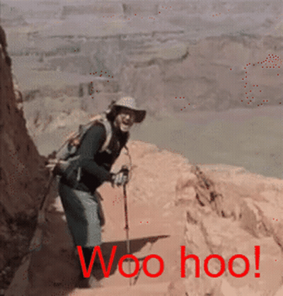 A Man With A Backpack And Hiking Poles Is Standing On A Rocky Cliff With The Words Woo Hoo Written In Red GIF