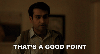 A Man With A Backpack Says That 'S A Good Point In A Dark Room GIF