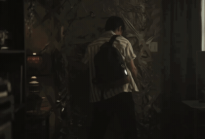 A Man With A Backpack Stands In A Dark Room With The Words If You 'Re Having Trouble With The Door Below Him GIF