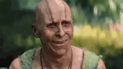 A Man With A Bald Head Is Making A Funny Face . GIF
